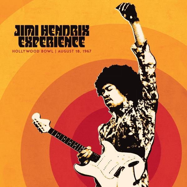 Jimi Hendrix spielt eine weiße Gitarre auf der Bühne. Das Poster zeigt den Namen der Veranstaltung und das Datum.