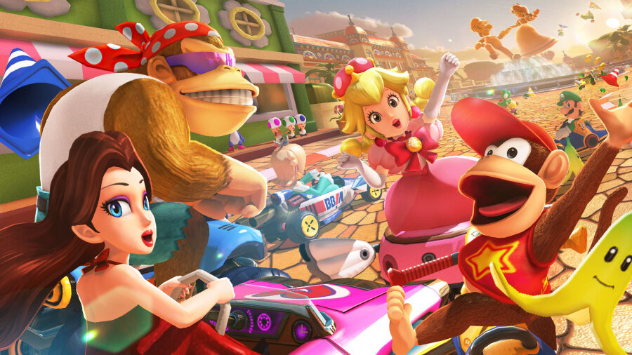 Scena z Mario Kart z Donkey Kongiem, Księżniczką Peach, Mario i innymi postaciami biorącymi udział w wyścigu.