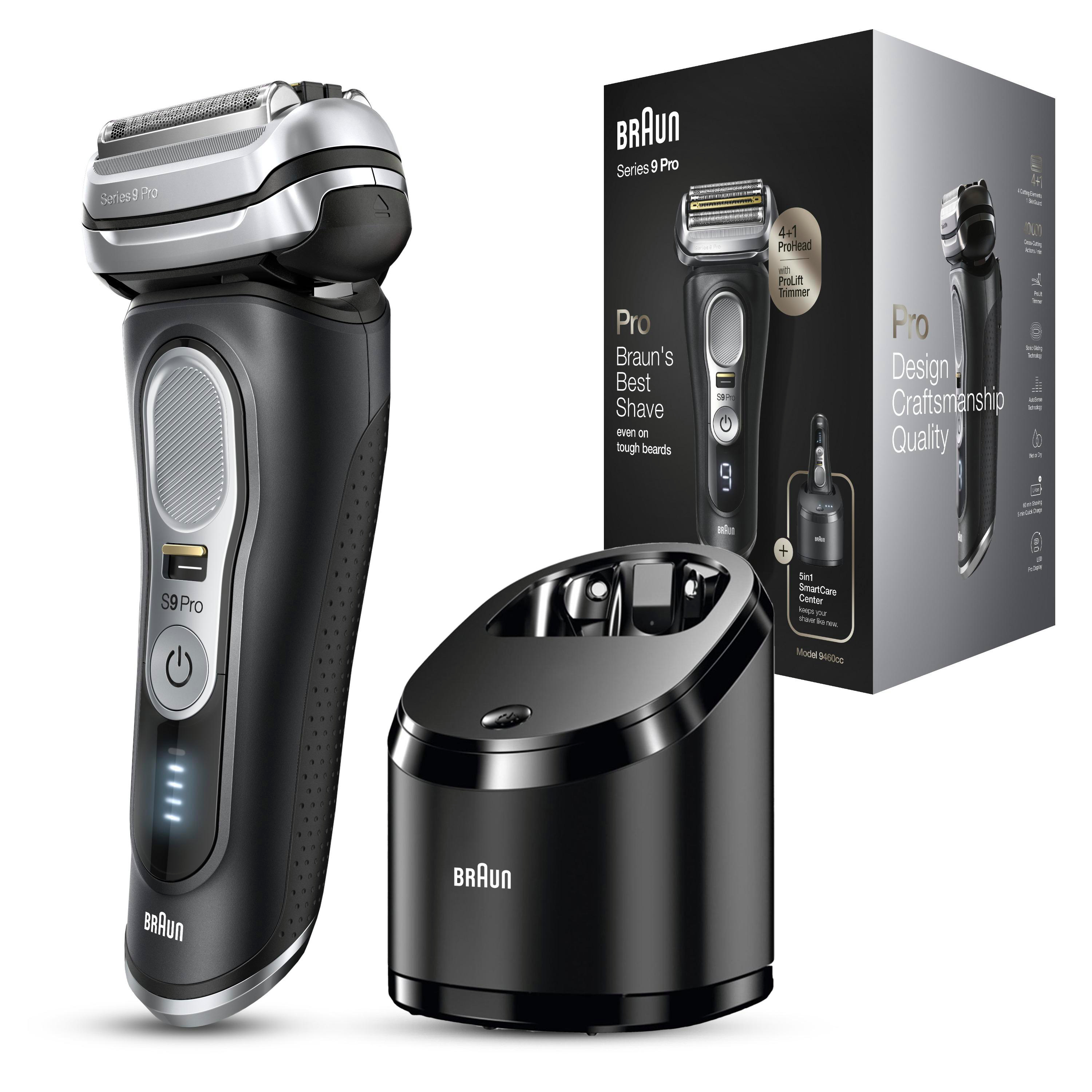 Braun Series 9 Pro Rasierer, Ladestation und Box. Schwarzer Rasierer mit silbernen Akzenten, schwarzem Ständer, und Box.