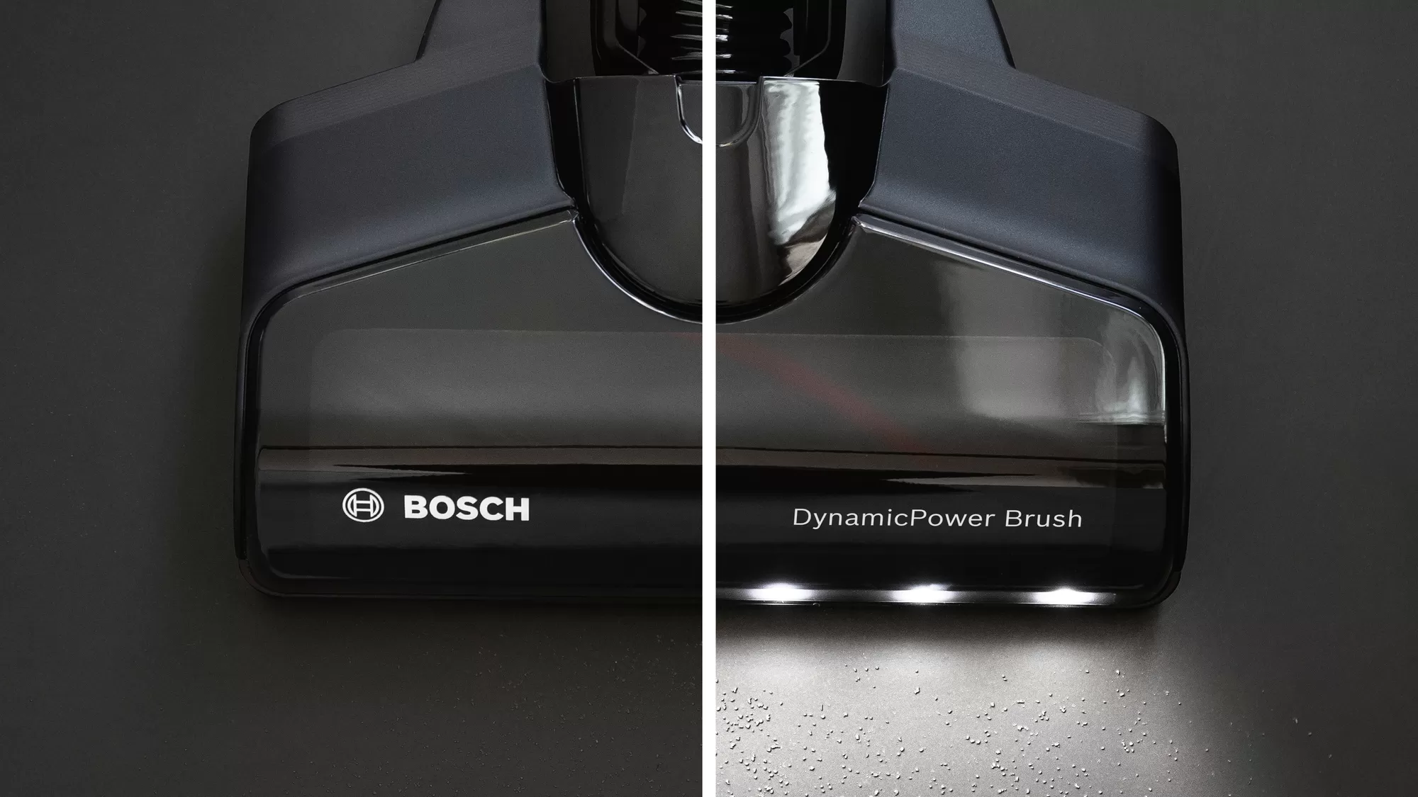 Egy fekete Bosch porszívó fejének közeli képe. A bal oldalon a Bosch logó látható. A jobb oldalon a 'DynamicPower Brush' és a LED-ek.