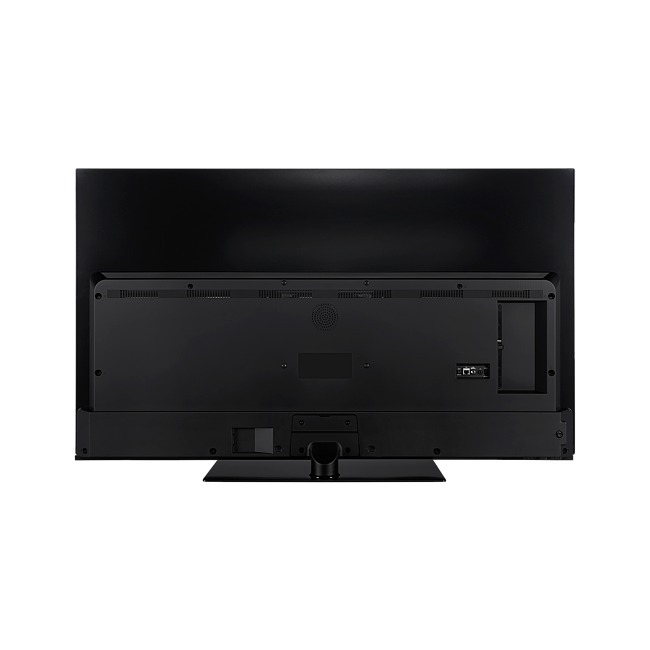 La parte trasera de un televisor negro con puertos visibles. El soporte está fijado en la parte inferior.