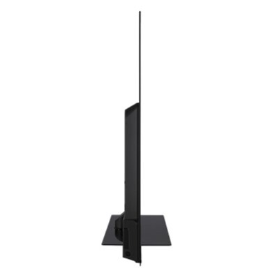 Perfil lateral negro de un televisor, montado en un soporte. La pantalla es delgada.