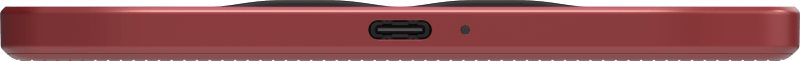 Primer plano de la parte inferior de un dispositivo rojo con puerto USB-C.