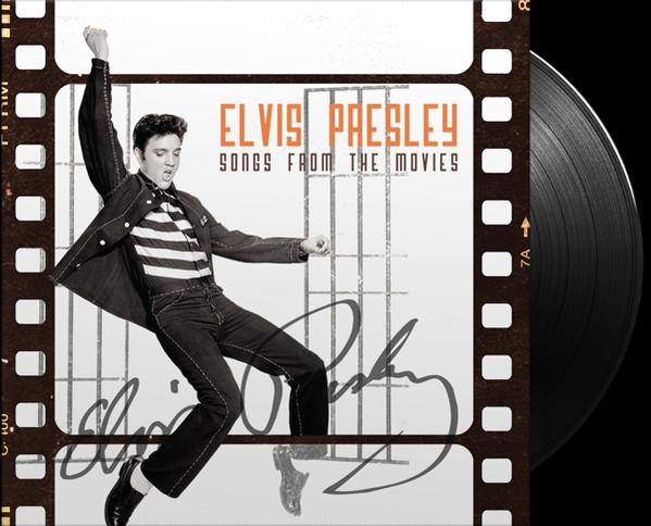 Elvis Presley album borítója. Csíkos inget és fekete öltönyt visel, pózol. Szöveg: Elvis Presley Songs From The Movies.
