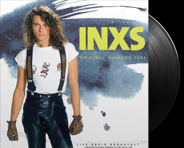 Az INXS album borítója, egy fehér inges férfival. Vinil lemez jobbra.