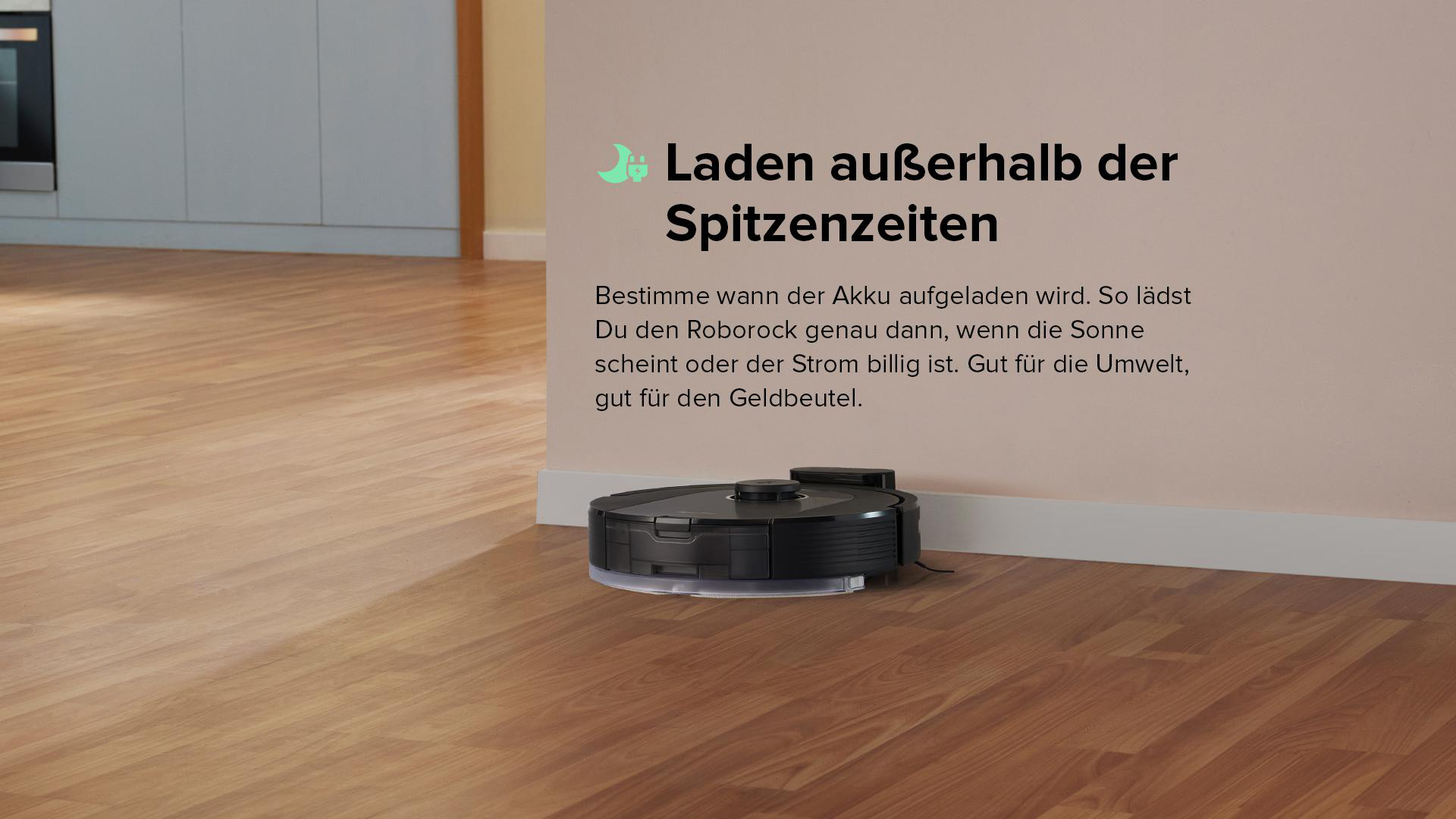 Ein Roboter-Staubsauger auf einem Holzboden neben einer Wand mit Text in Deutsch.