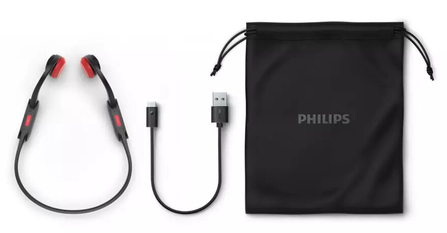 Czarne i czerwone słuchawki sportowe, kabel USB-C i czarny woreczek z logo Philips.