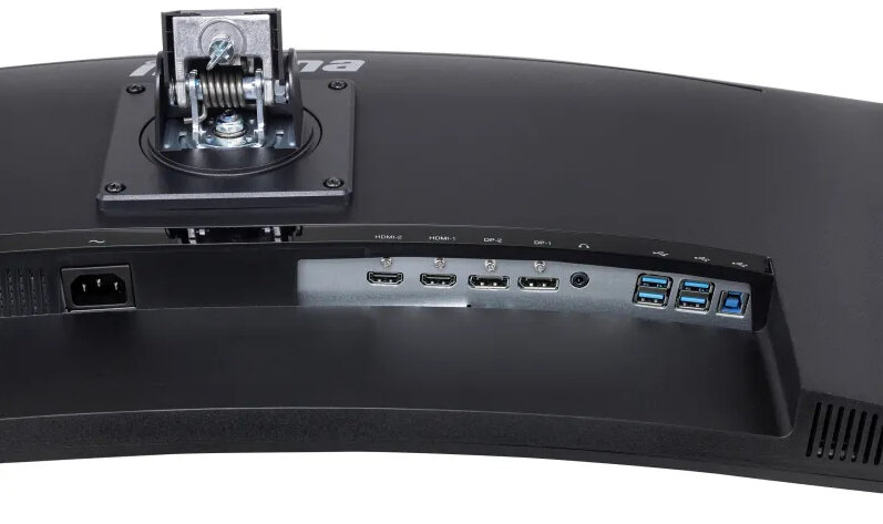 Tył zakrzywionego monitora z różnymi portami.