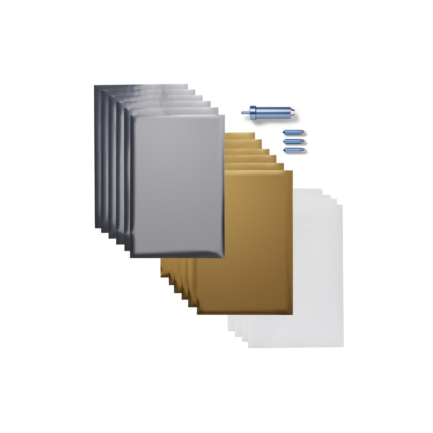 Various sheets of crafting material: silver, gold, and white, with tools.