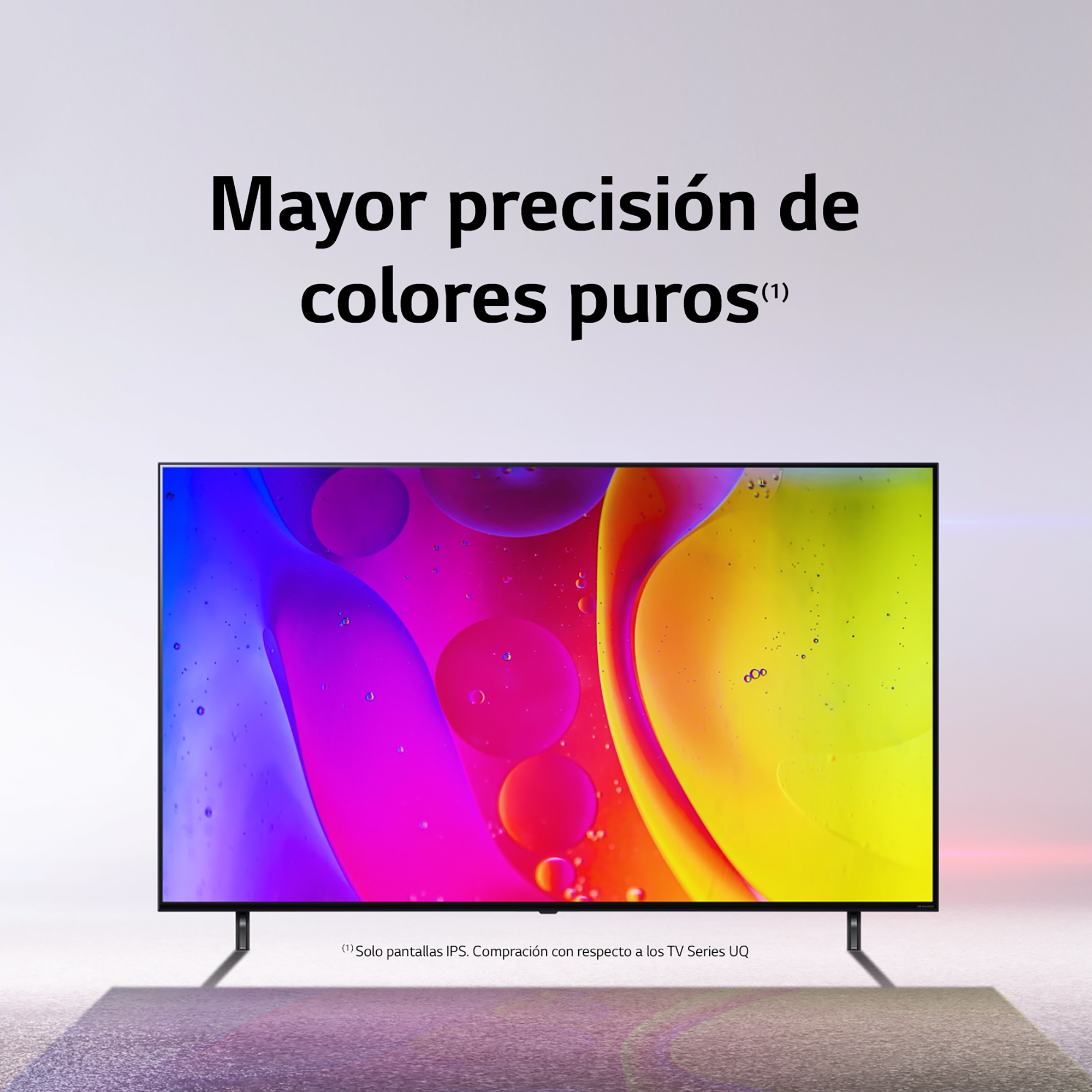 Una pantalla de TV con una imagen abstracta colorida. El televisor está sobre una superficie blanca con una luz colorida debajo.
