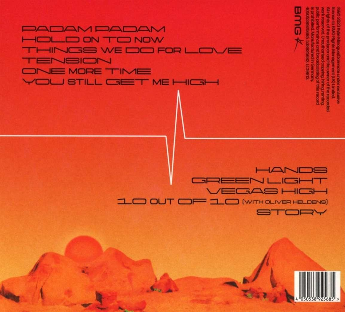 Rode albumhoes met tracklist en BMG-logo. Woestijnscène onderaan met een bergketen.