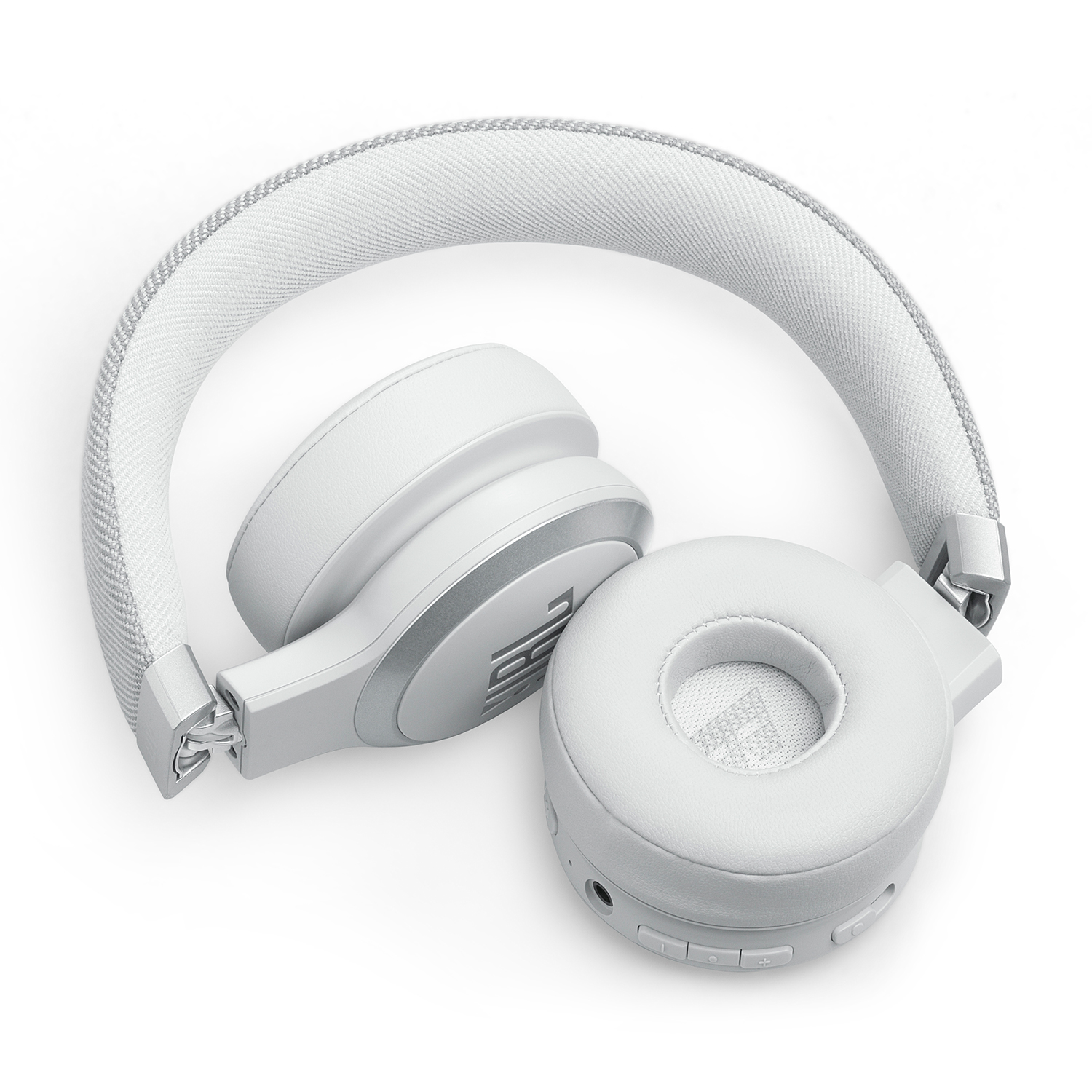 Cuffie JBL bianche. Padiglioni auricolari e archetto sono bianchi, con il logo JBL visibile.