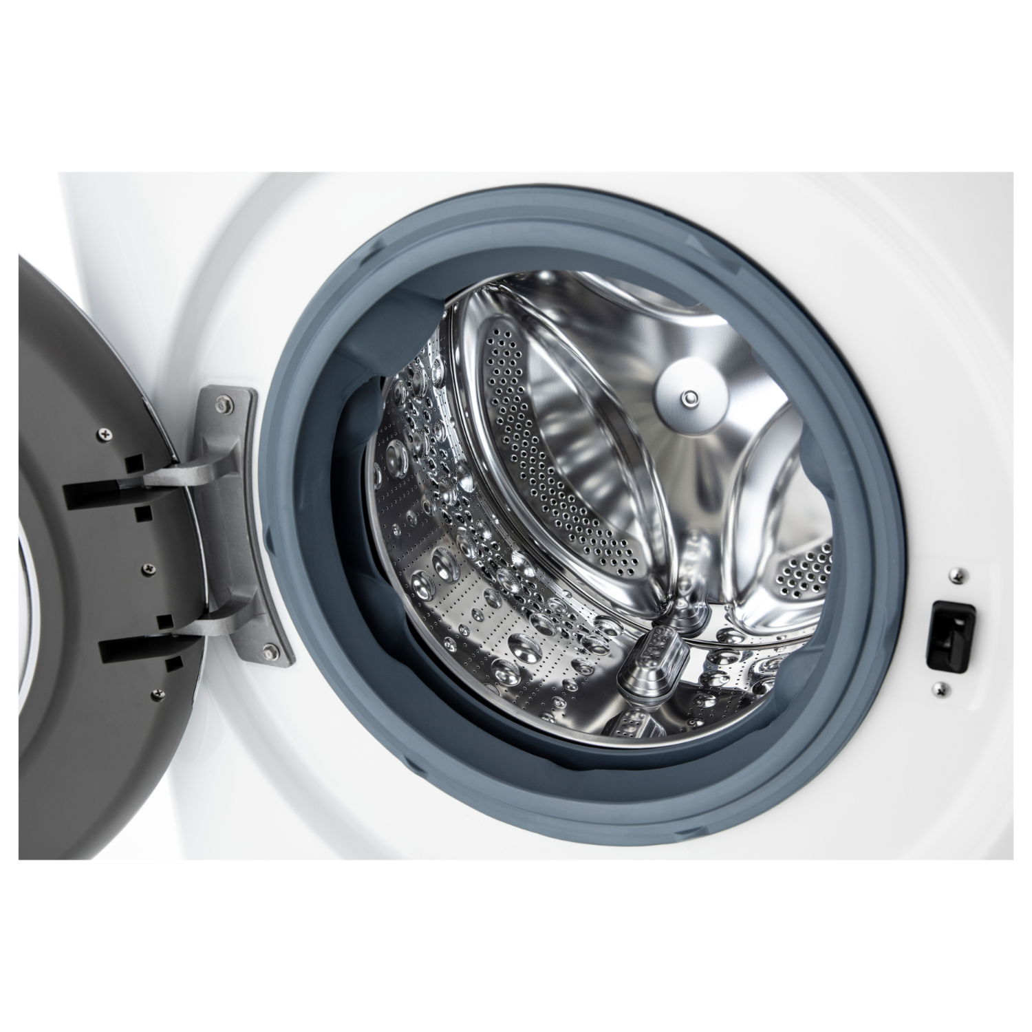 Washing machine interior with an open door. The drum is stainless steel. The door is open with a rubber seal.