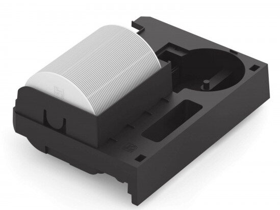 Czarna część drukarki zawierająca białą rolkę papieru.