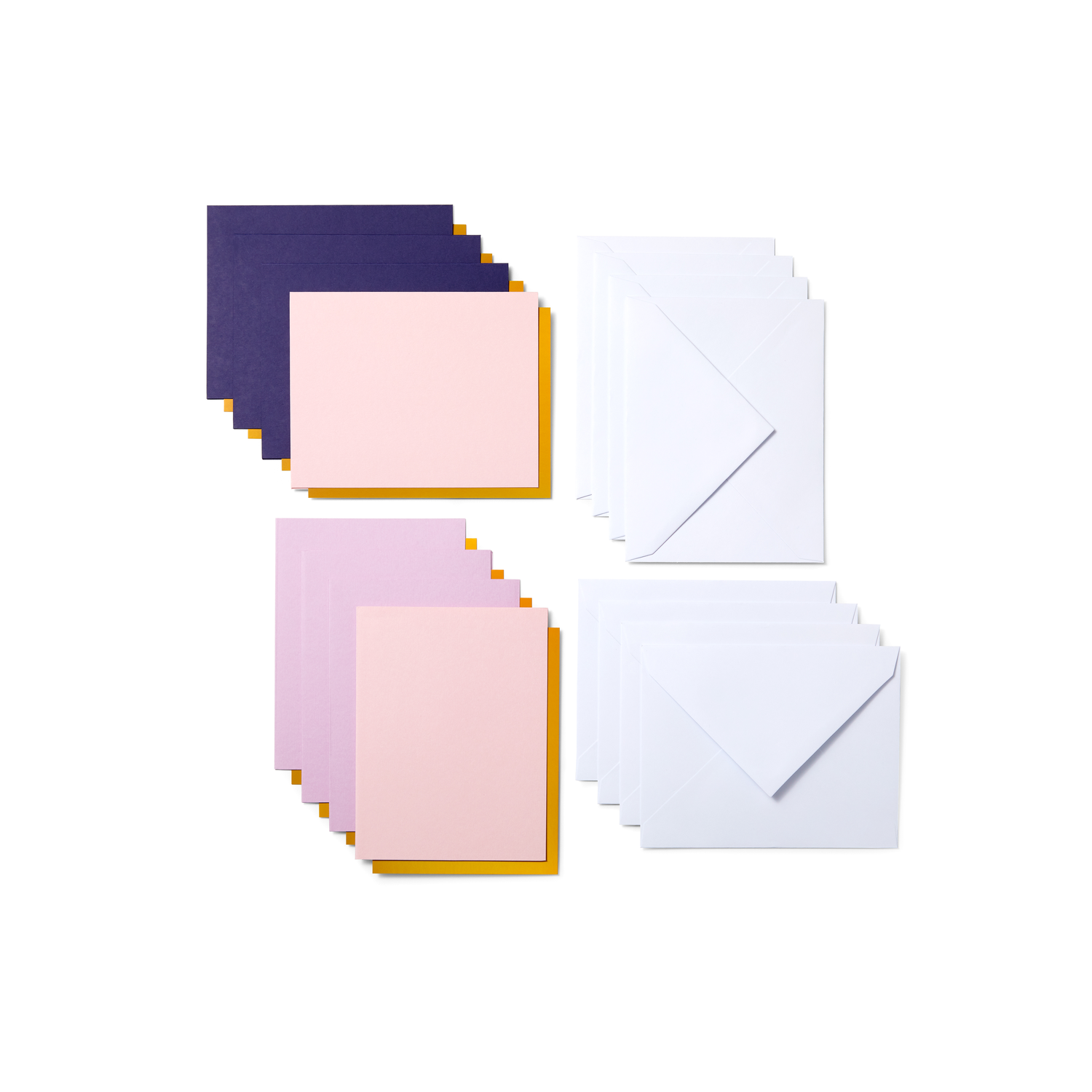 Stationery with envelopes and papers in pastel colors on a white background.