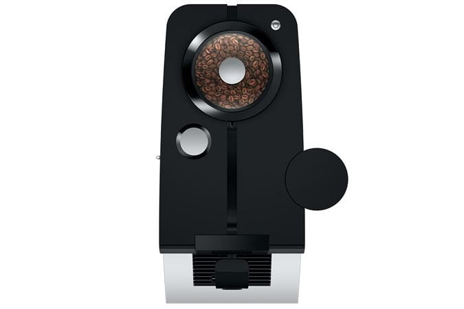 Cafetera negra con granos de café visibles.