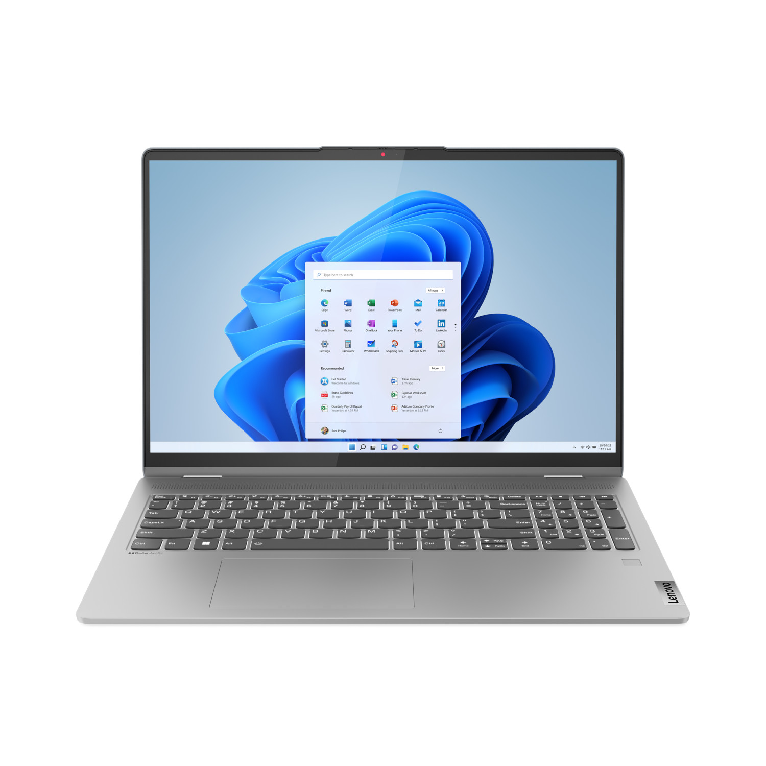 Un ordinateur portable argenté avec une interface Windows 11, un clavier et un pavé tactile, sur une surface blanche.