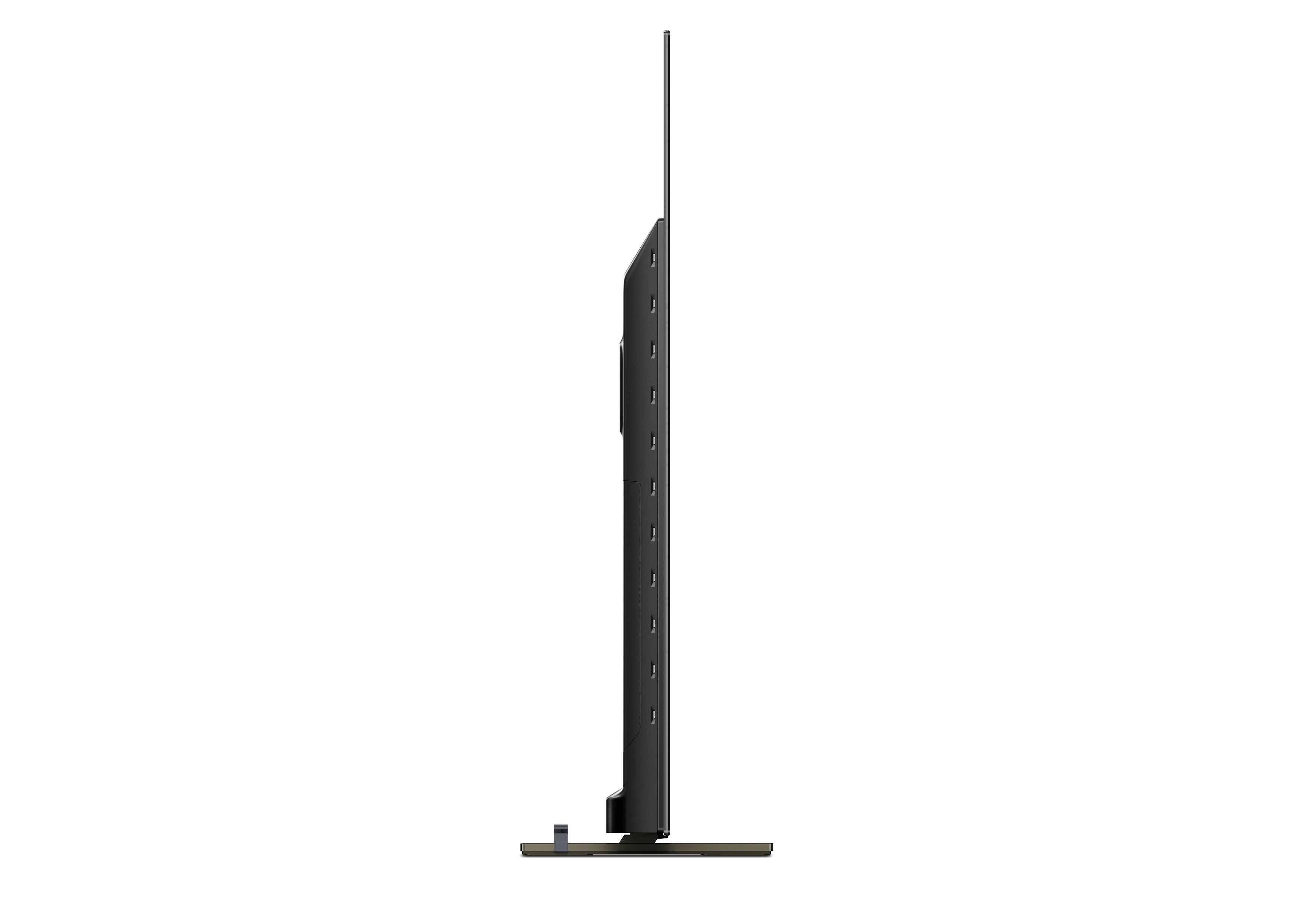 Şık, ince siyah bir TV'nin yan görünümü. TV minimalist bir tasarıma sahip.