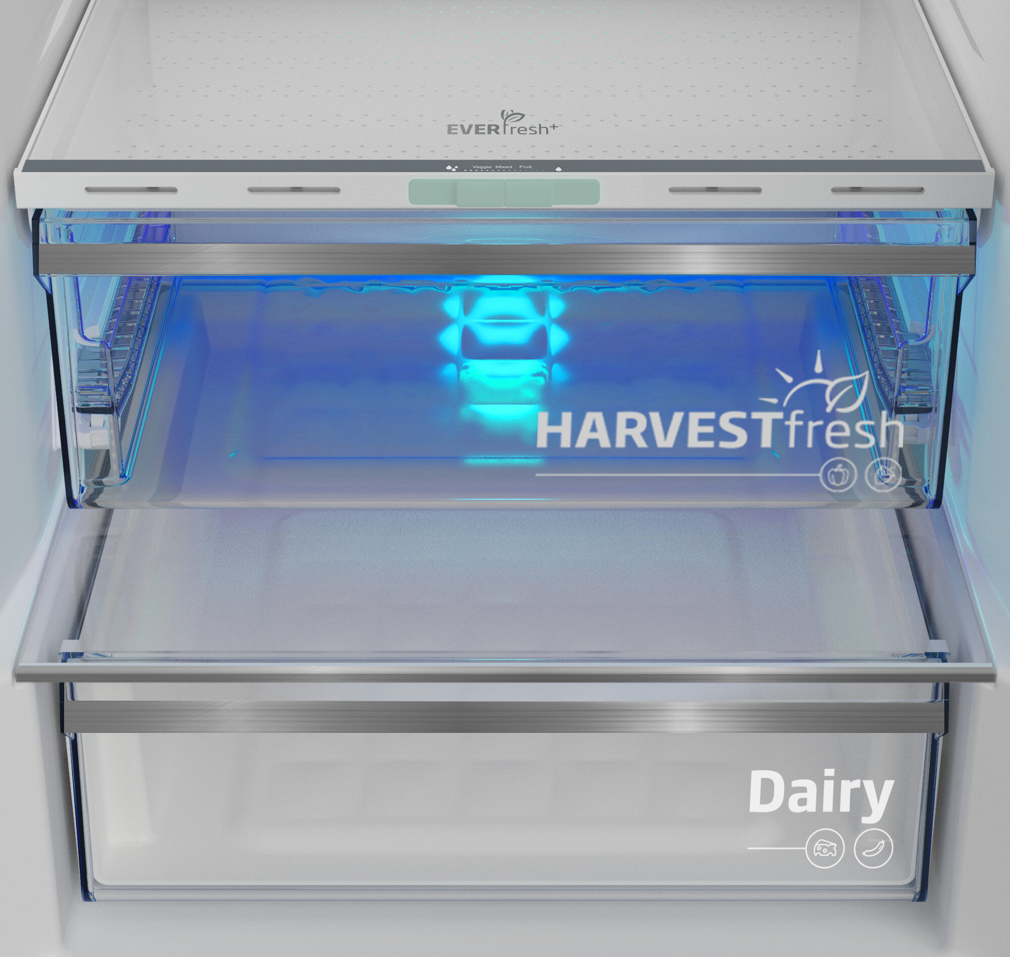 Zbliżenie wnętrza lodówki. Szuflada HarvestFresh oświetlona niebieskim światłem. Szuflada Dairy poniżej.