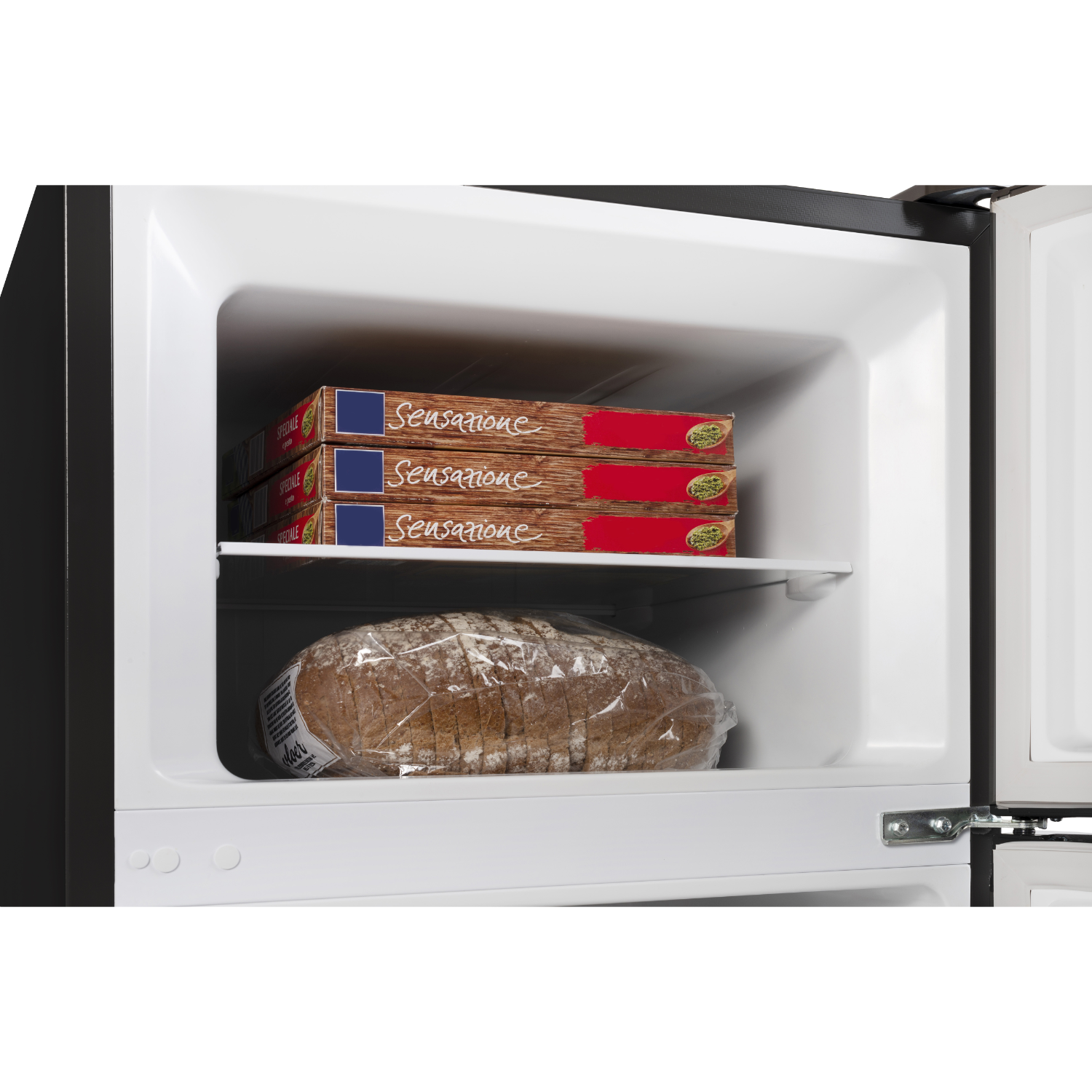 Refrigerator interior with bread and pizza boxes on shelves.