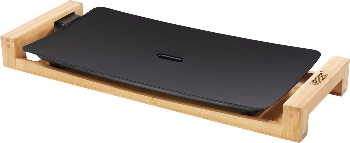 Black electric grill on a bamboo stand. A Princess brand logo is visible.