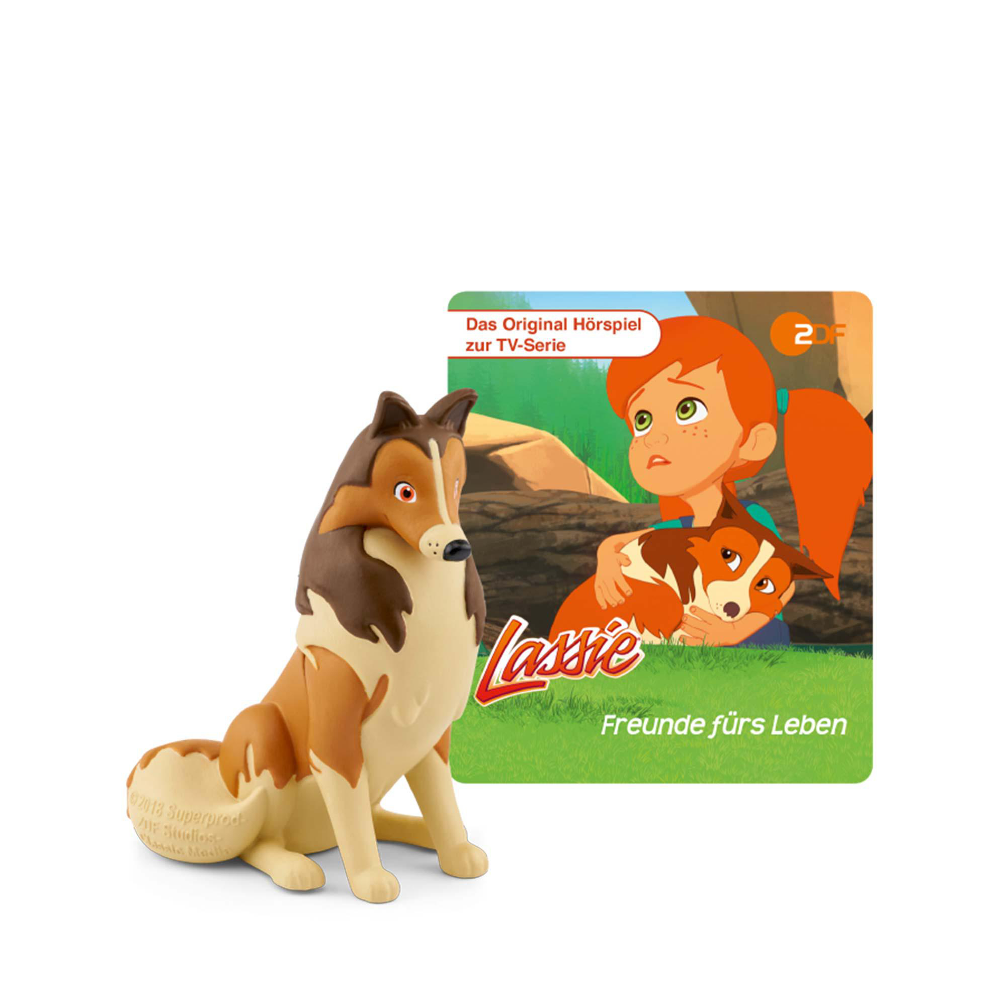 Eine Lassie-Figur und ein Cartoon-Bild von Lassie und einem Mädchen.