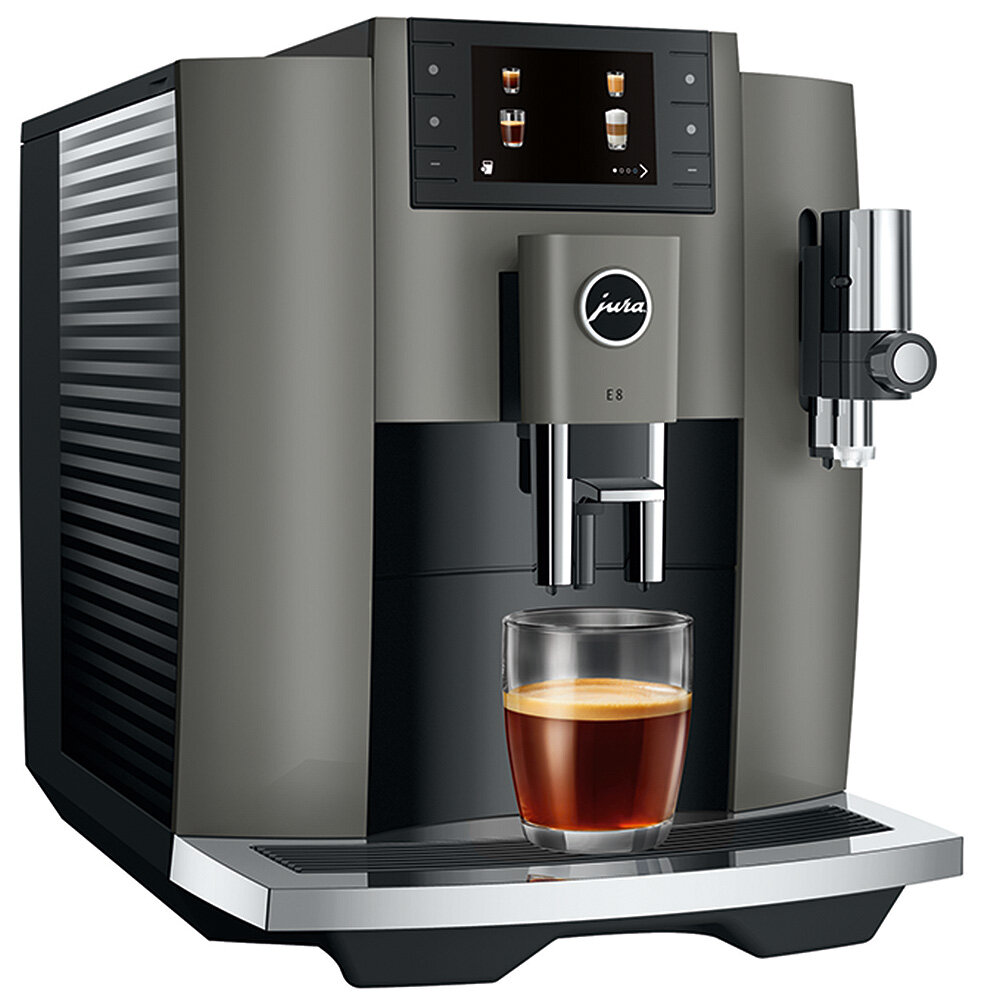 Szara i czarna maszyna do espresso ze szklanką kawy.