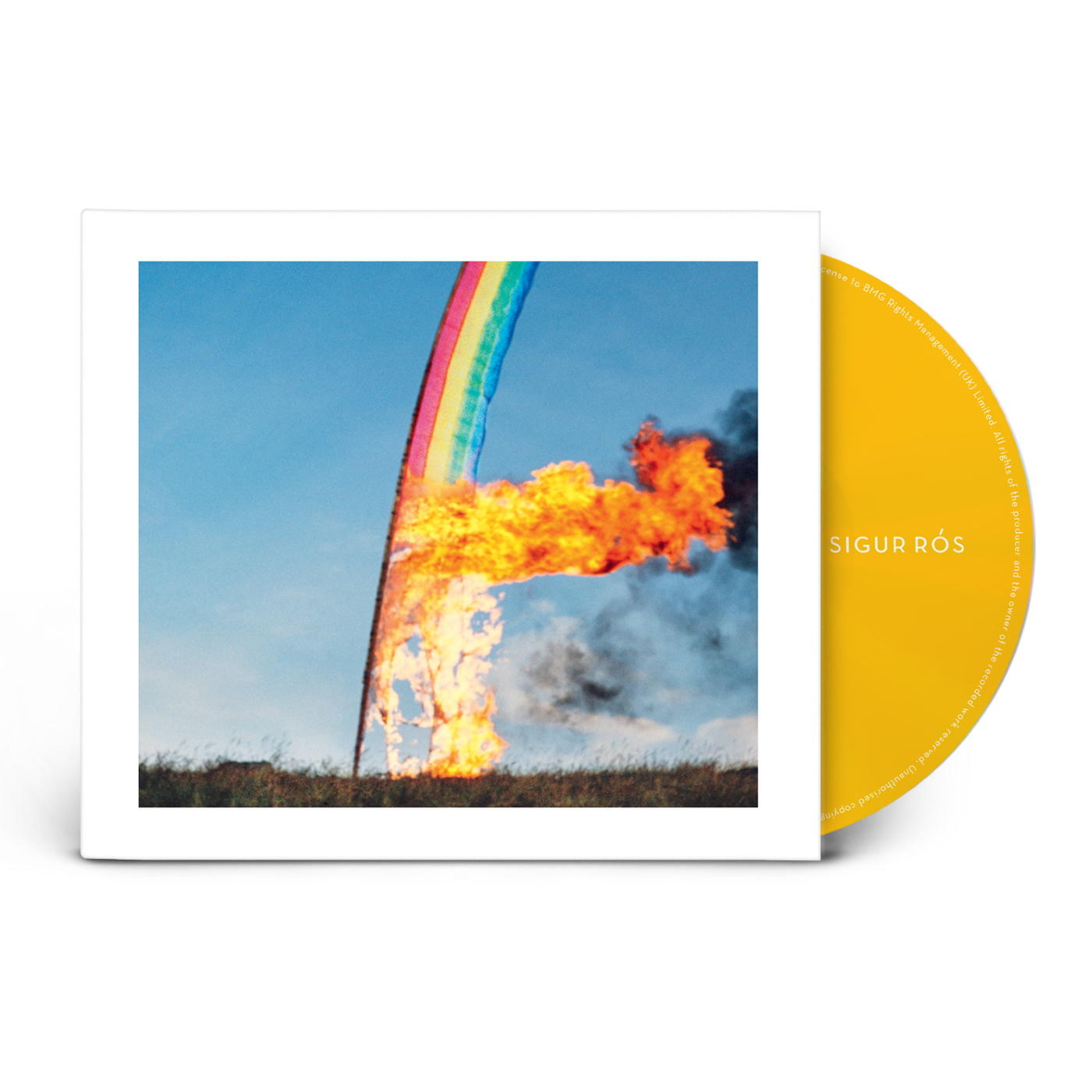 CD borító égő szivárvánnyal. A CD sárga, a borító fehér.