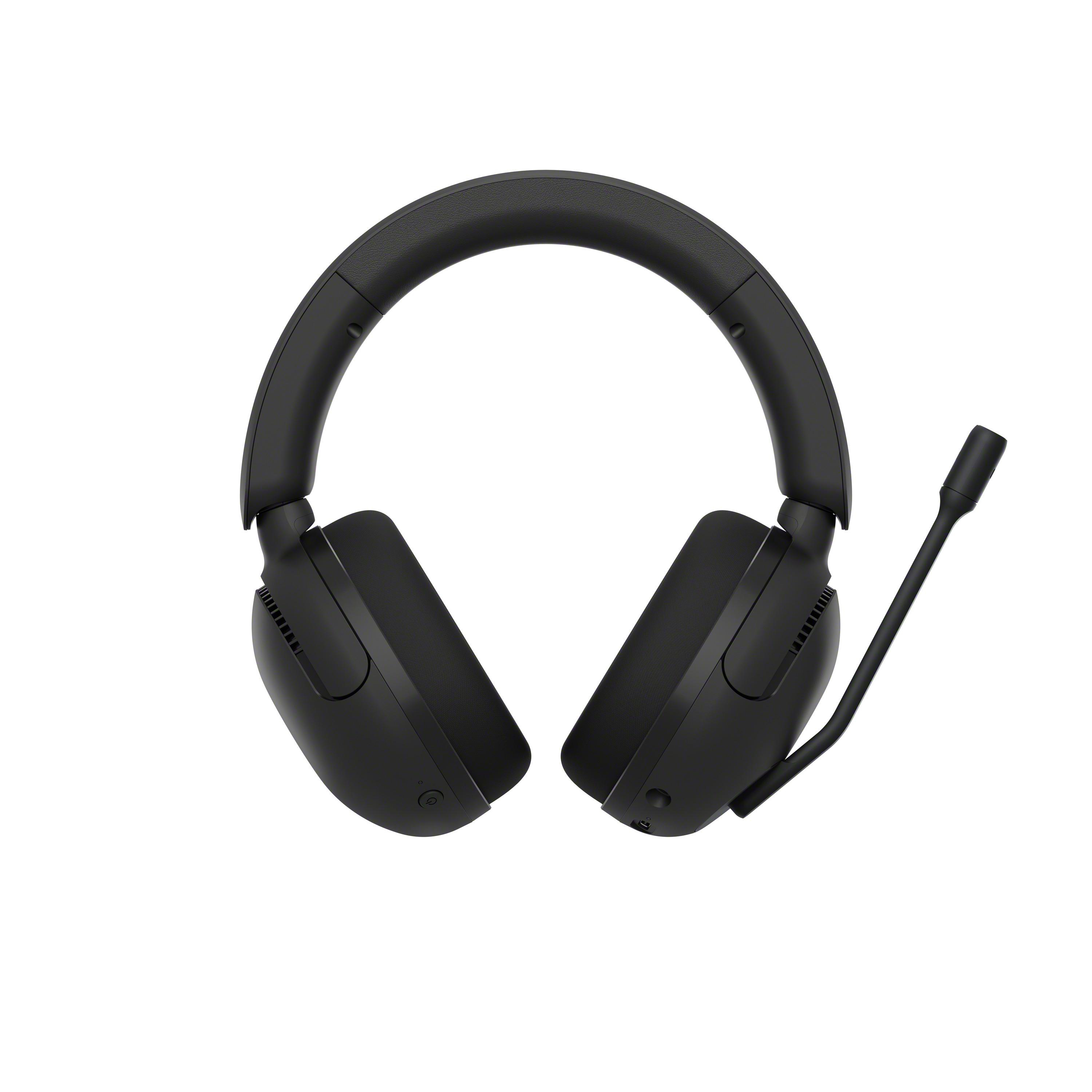 Schwarze Over-Ear-Kopfhörer mit Mikrofon. Weißer Hintergrund. Draufsicht.
