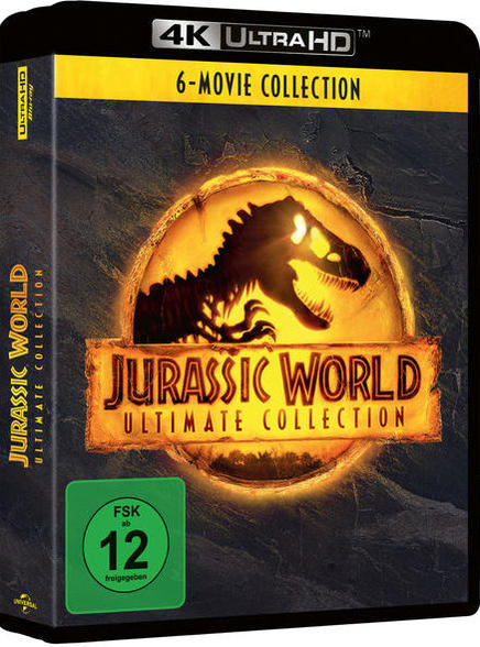 Schwarze, einziehbare Steckdosen auf einer Holzoberfläche.