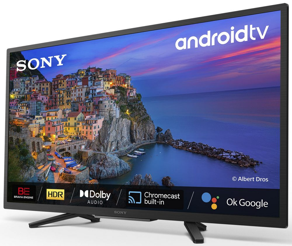 Un televisor Sony Android muestra un paisaje urbano colorido sobre agua, con iconos abajo.