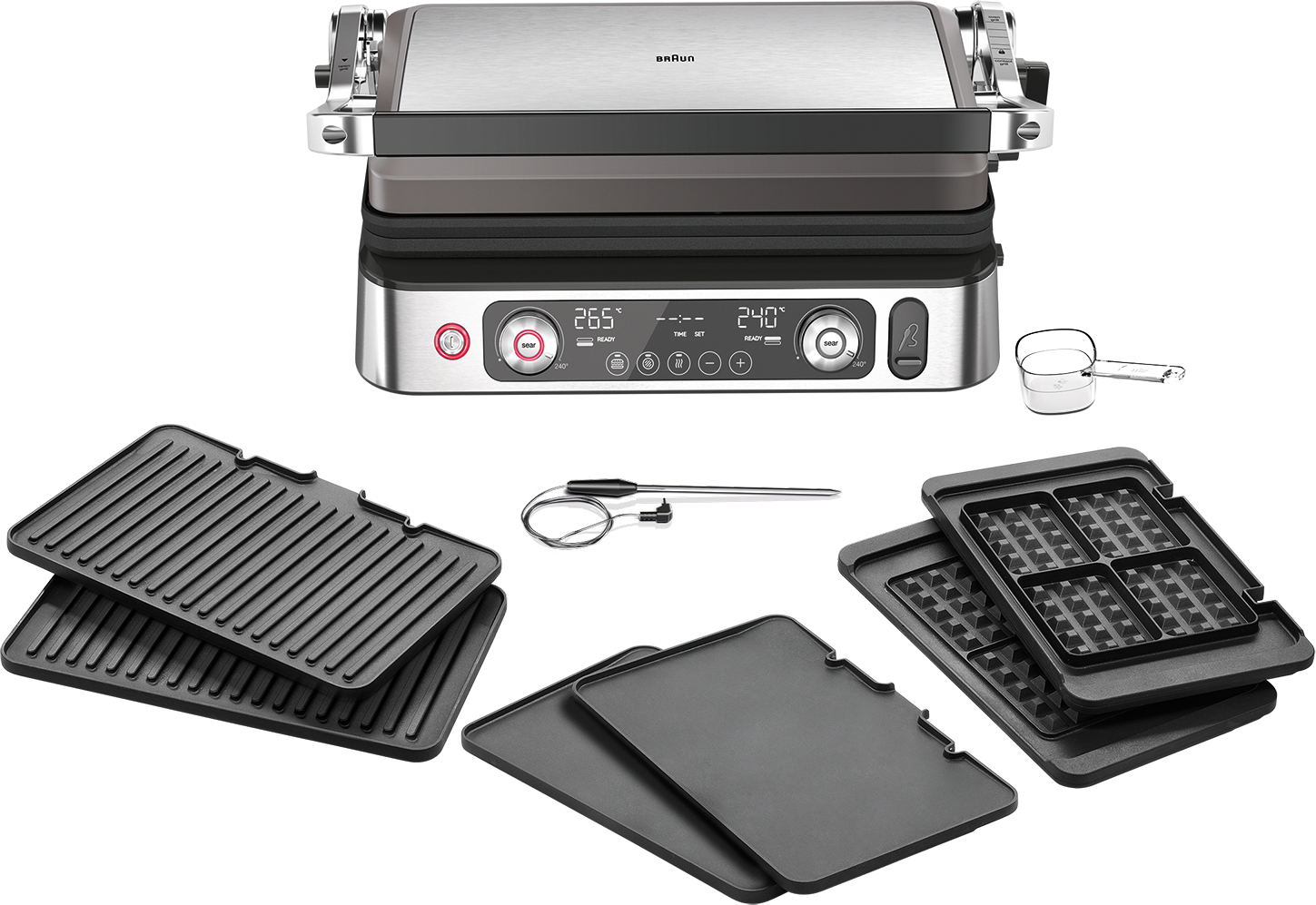 Ein Braun-Grill mit Zubehör, einschließlich Platten, Messbecher und Pinsel.