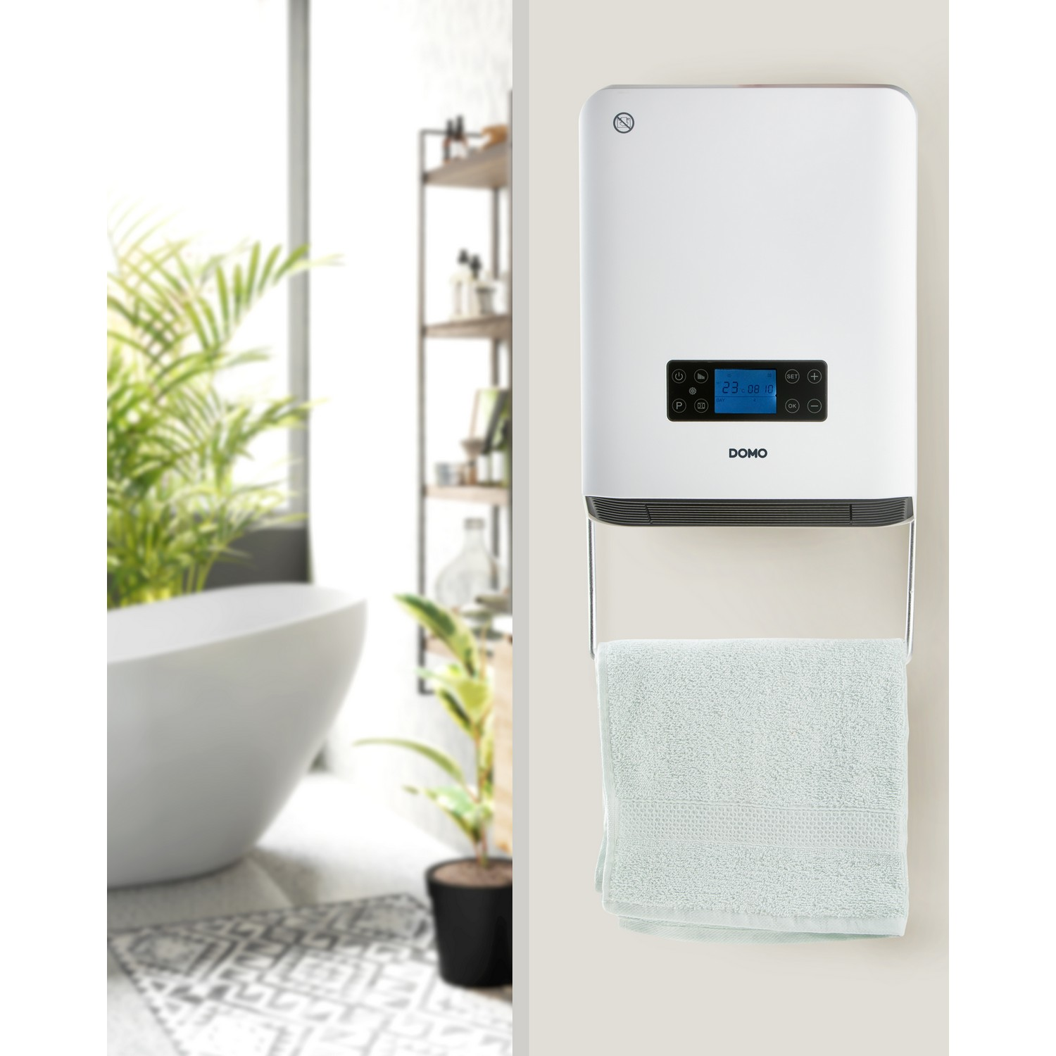 A white wall-mounted heater with a towel hanging below, in a bathroom setting.