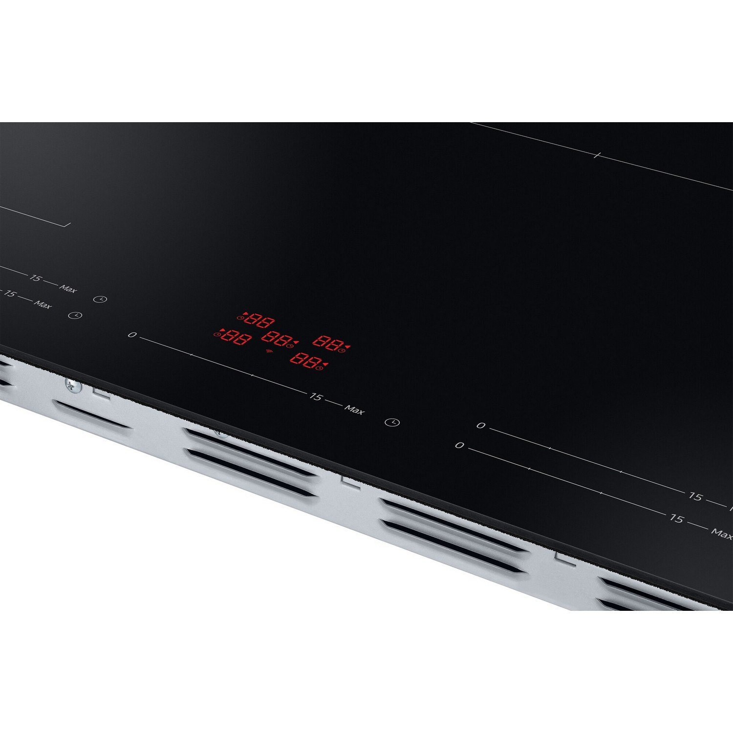 Close-up of a black induction cooktop with red digital display showing numbers and settings.