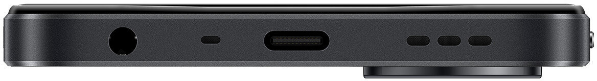 Zbliżenie dolnej krawędzi czarnego smartfona z gniazdem słuchawkowym, portem USB-C i otworami głośnika.