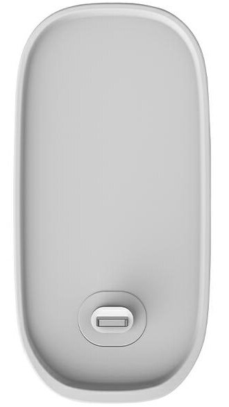 Jasnoszara podstawa ładująca z portem USB-C na dole.