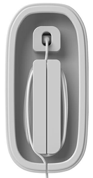 Białe urządzenie na ścianie, z kablem i dwoma białymi prostokątami. Minimalistyczny design.