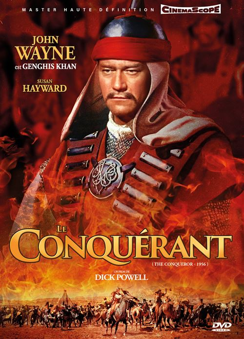 Affiche de film avec John Wayne, en tenue rouge, devant un fond de feu.