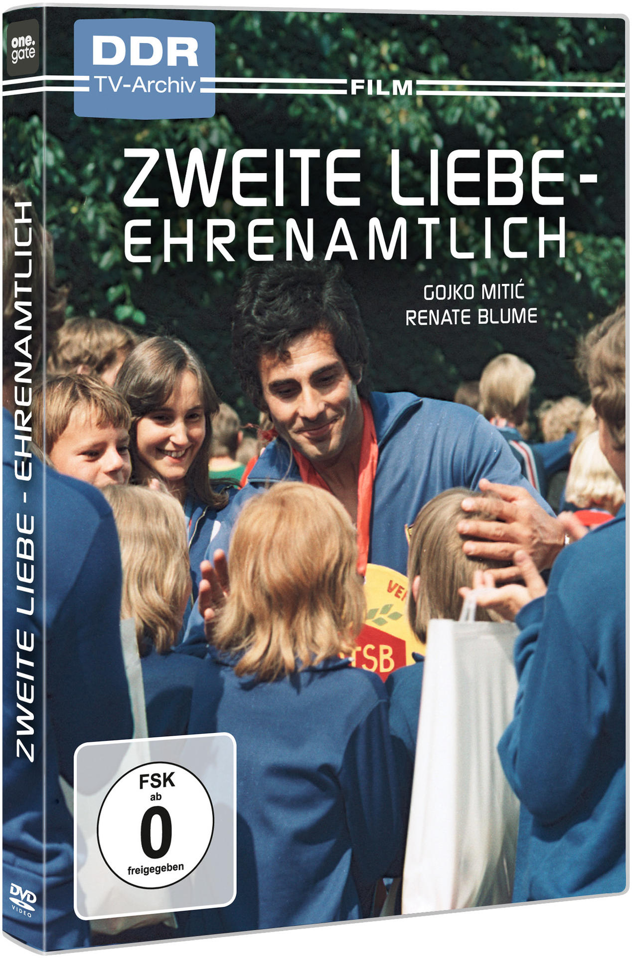 DVD-Hülle mit Filmplakat. Leute überreichen einem Mann eine Medaille. Der Titel ist auf Deutsch.
