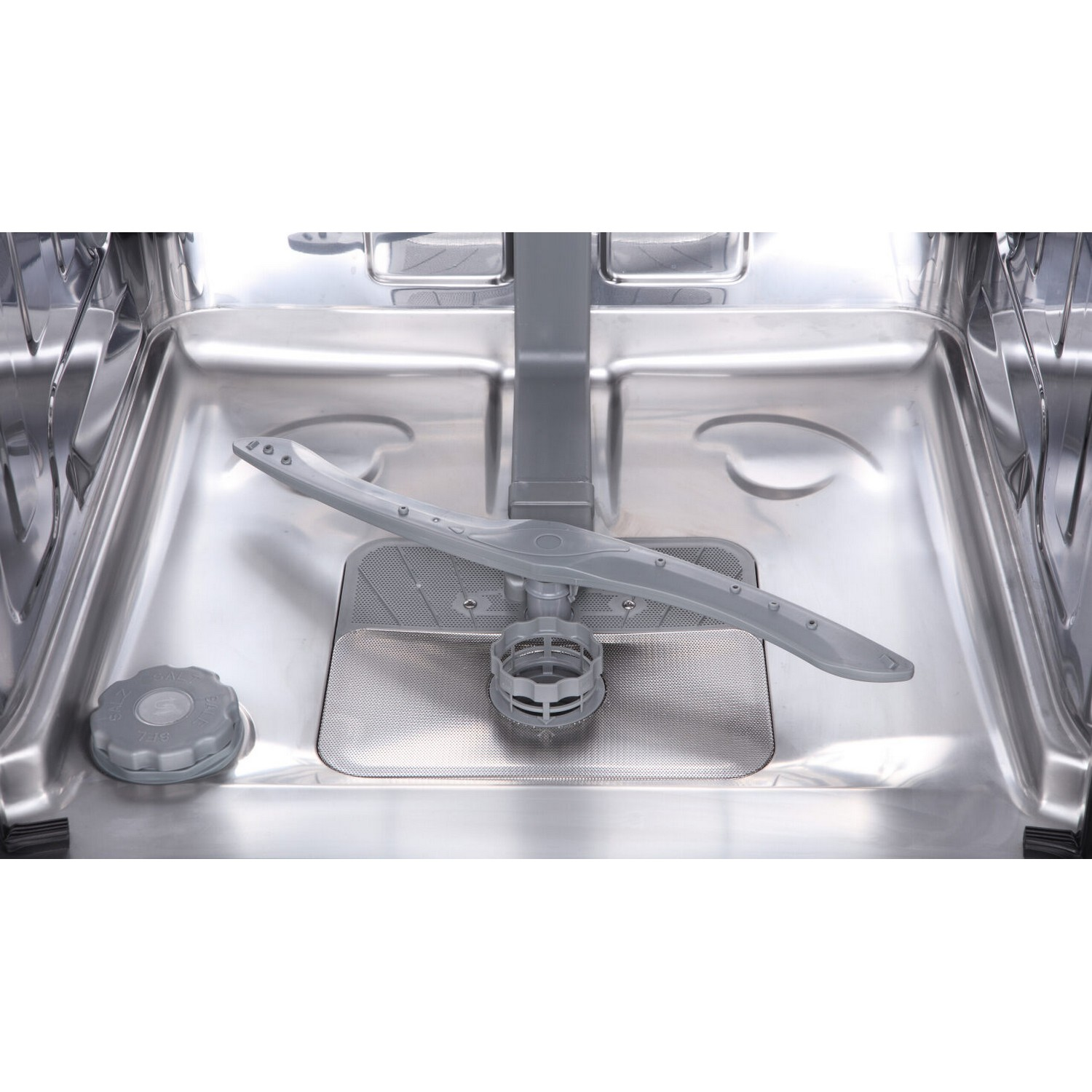 Inside of a dishwasher, with a spray arm and a filter. Stainless steel interior.