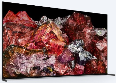 Ekran telewizora z żywym, kolorowym wzorem mineralnym na czarnym tle.