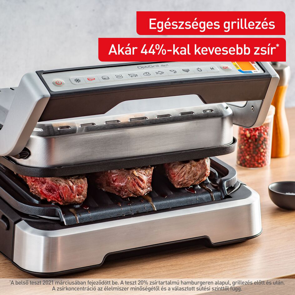 Egy grill steakkel, és szöveg, amely szerint a grillezés egészséges, kevesebb zsírral.