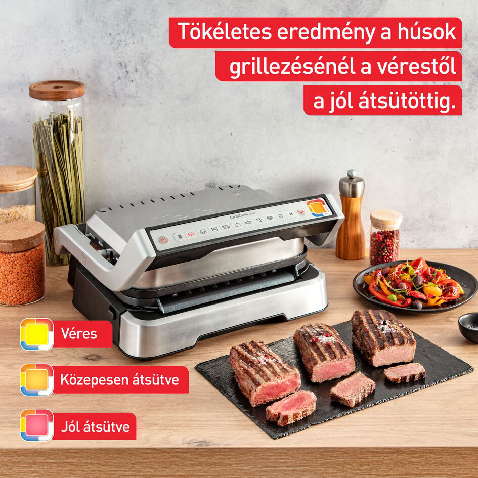 Grill szeletelt steakkel. A steakek véresek, közepesek és jól átsültek.