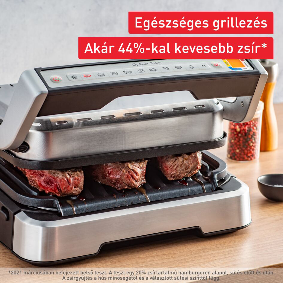 Elektromos grill hússal. A szöveg 44%-kal kevesebb zsírt jelez. Piros banner felül.