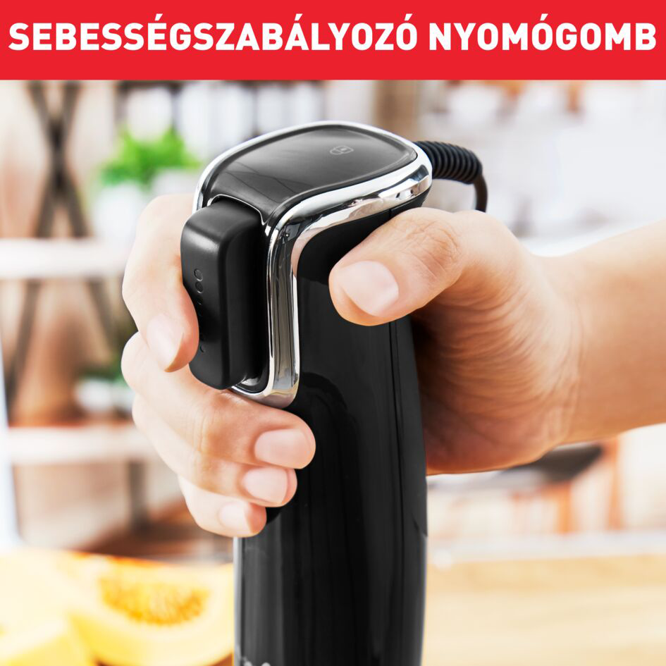 Kéz fekete botmixert tart. Szöveg: 'Sebességszabályozó gomb'.