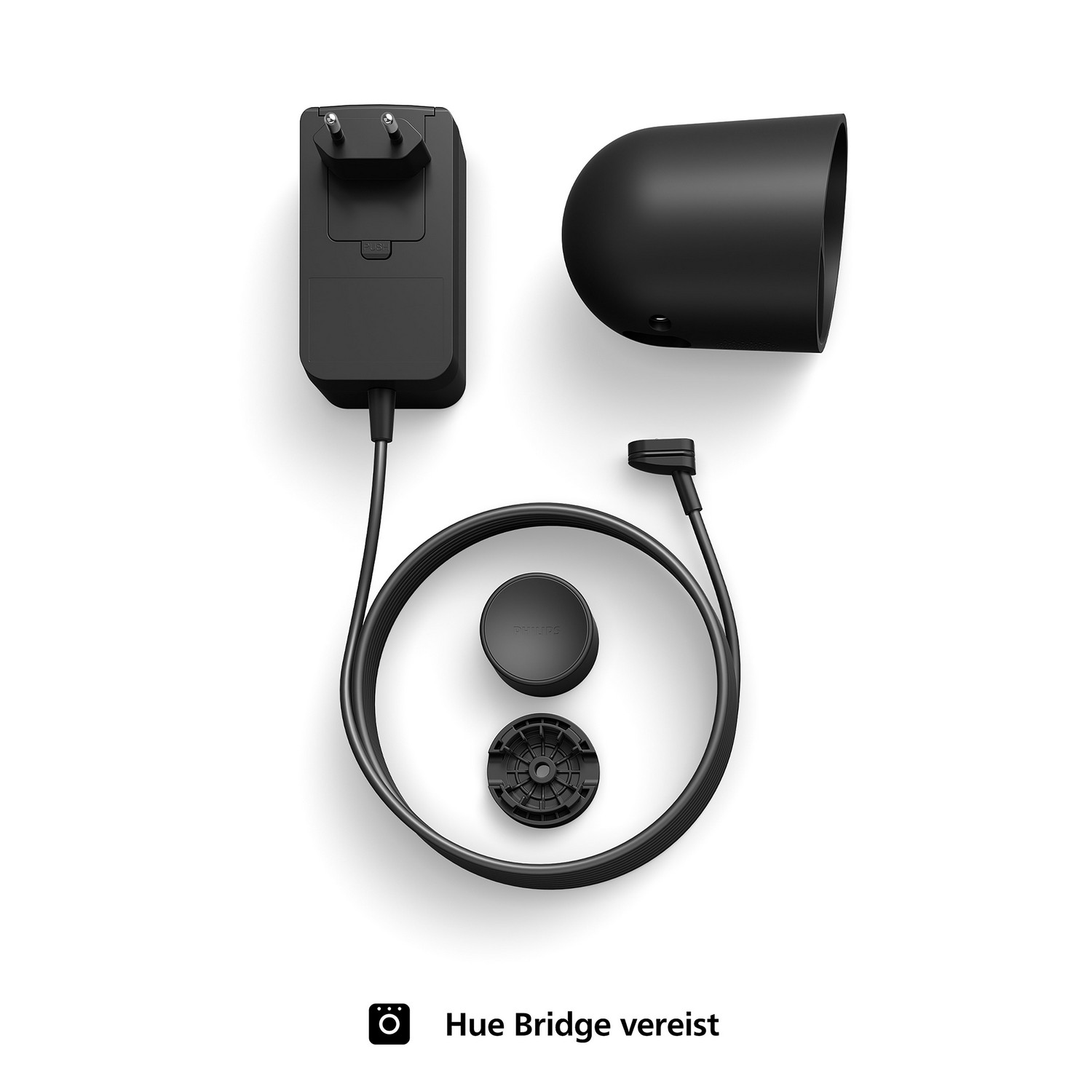 Components for a Hue Bridge: power adapter, bridge unit, black cable, and a connection base.