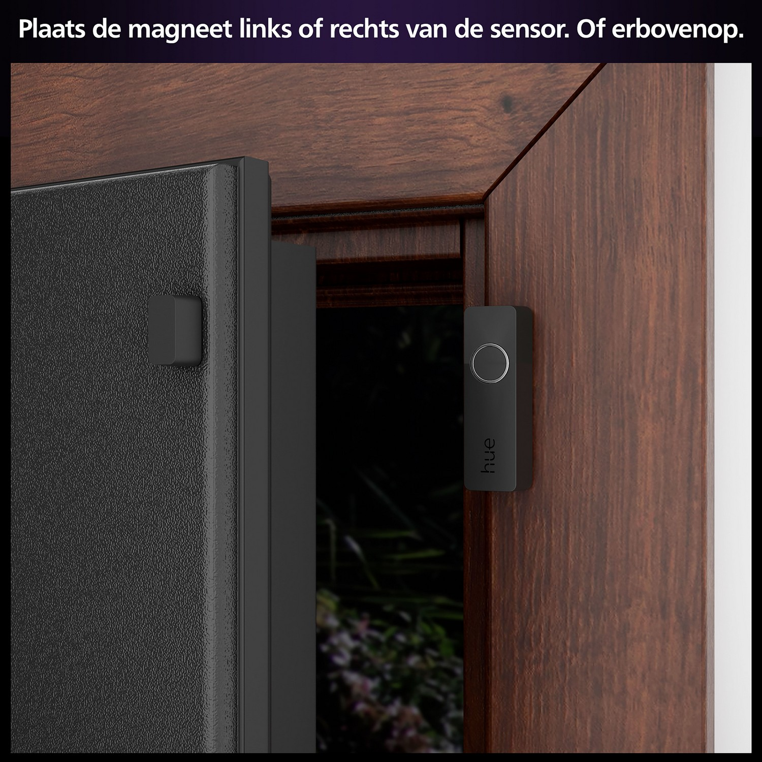 A dark brown door frame with a security sensor and a black door panel.
