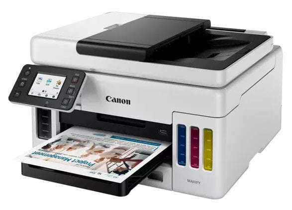 Biało-czarna drukarka Canon Maxify z wydrukowanym dokumentem w tacy wyjściowej.