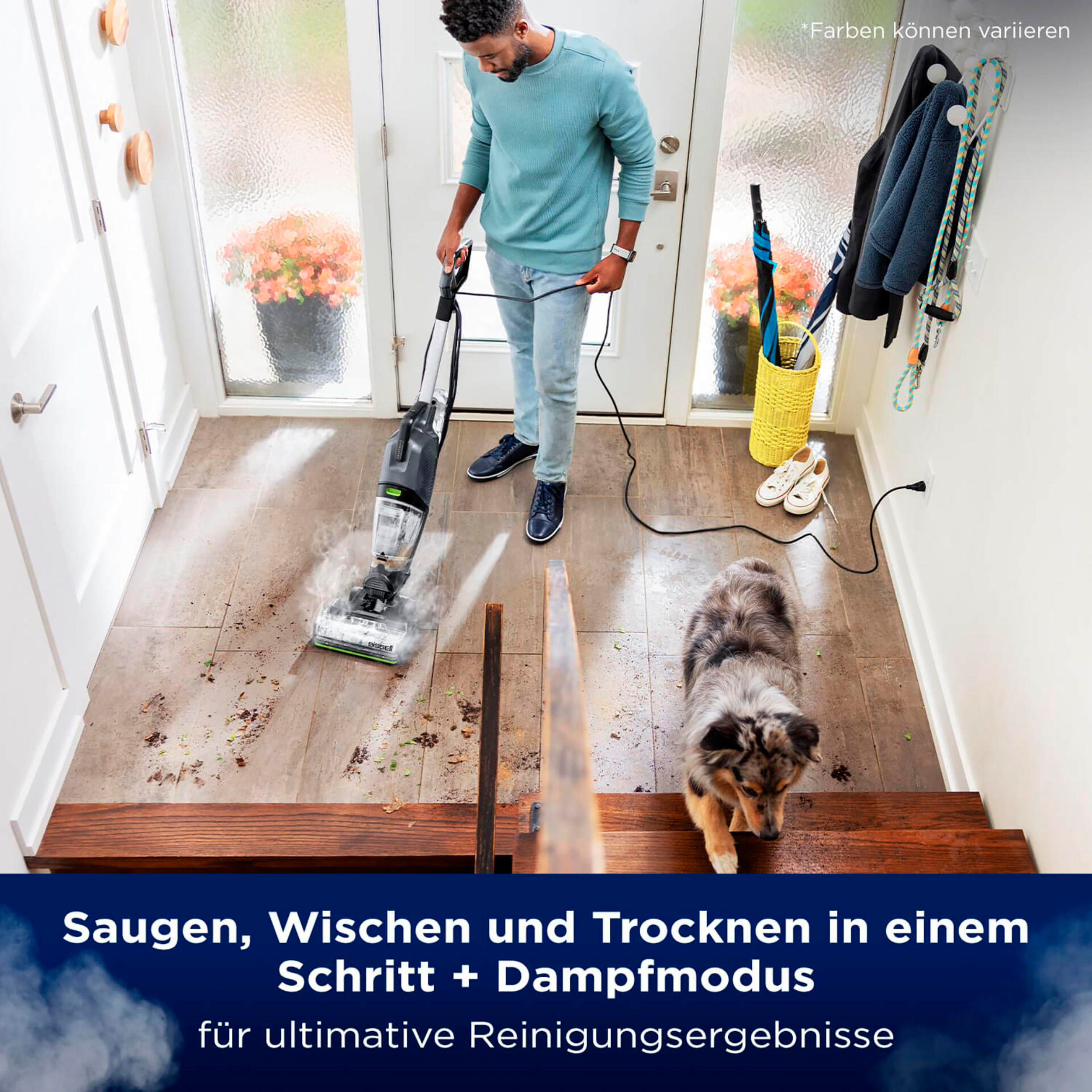 Ein Mann reinigt einen Boden mit einem Reiniger, mit einem Hund und Eingang im Hintergrund.