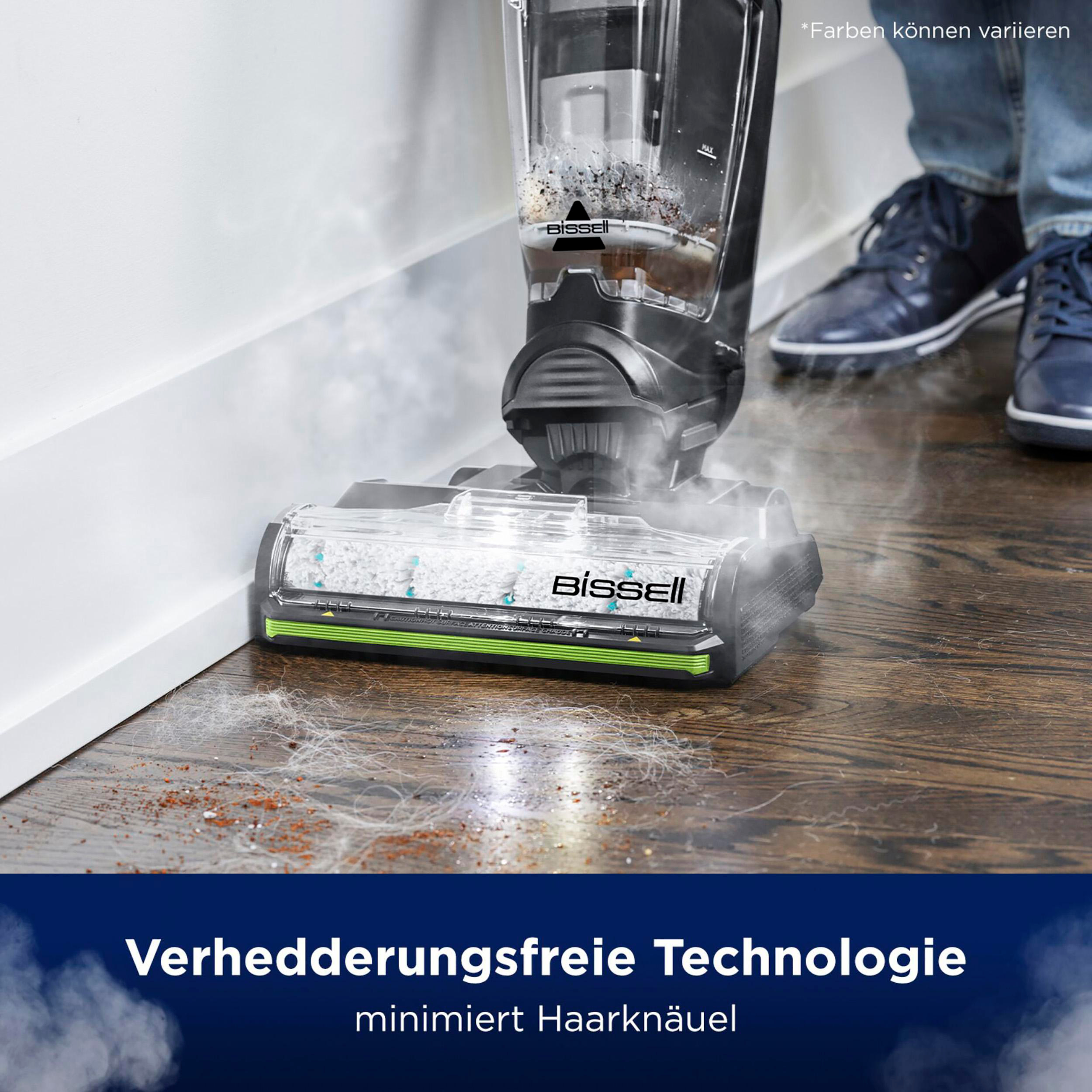 Ein Staubsaugerkopf auf Holzboden, der mit Dampf reinigt.